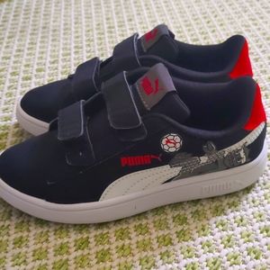 Puma sneakers for boy size 13C.